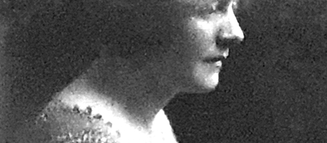 Vintage photo taken circa 1910 of blonde woman in profile
